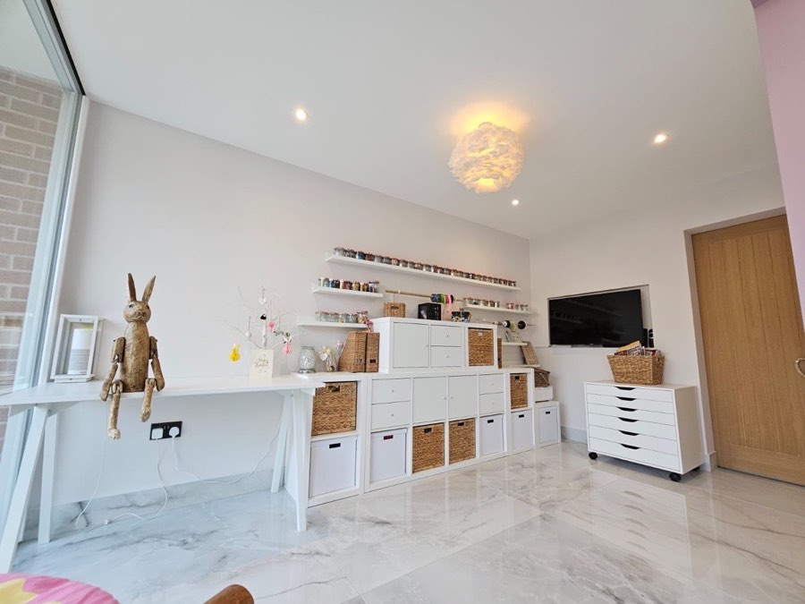 Bright white decorated bedroom